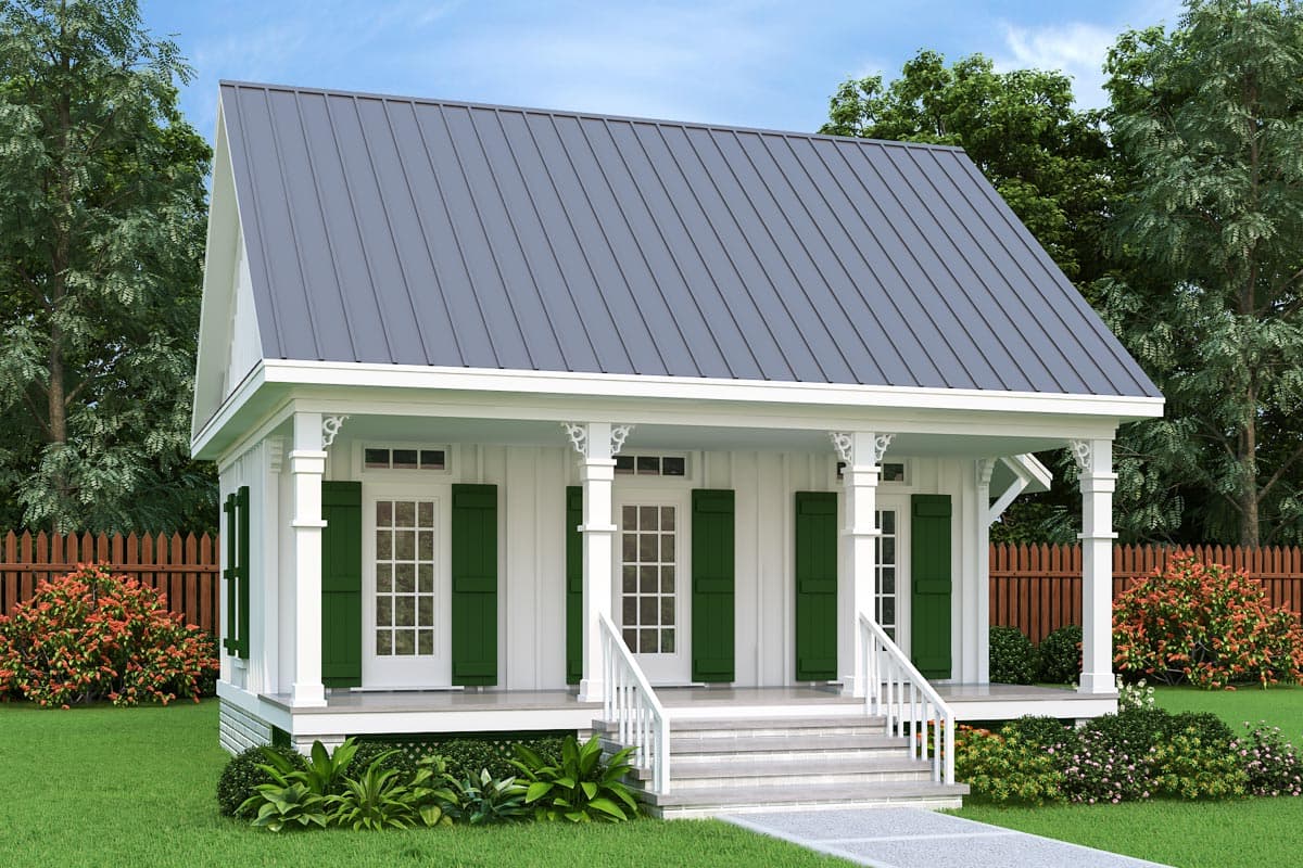 House plan exterior. One-story Cottage style with a porch, gabled roof, and decorative corbels. Features green shutters and a metal roof.