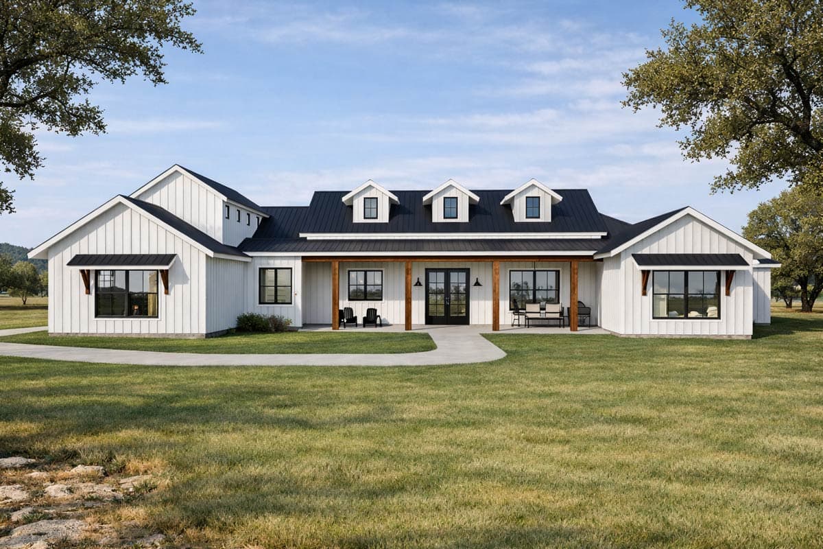 House plan exterior. Modern Farmhouse style with a single story, front porch with wooden columns, gables, and dormers.