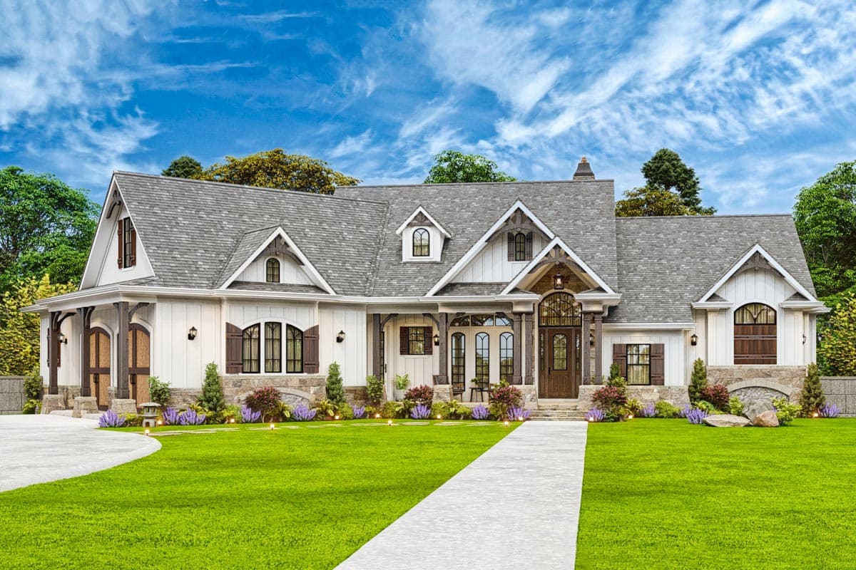 House plan exterior. Two-story Modern Farmhouse with gabled roof, arched entryway, dormers, and covered porch.