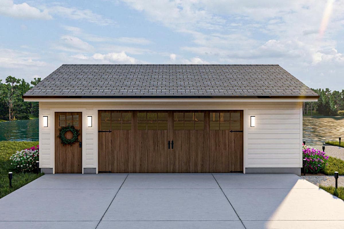 House plan exterior with two-car garage. Features include a gable roof, wood-paneled garage doors with glass panes, and side entry door.