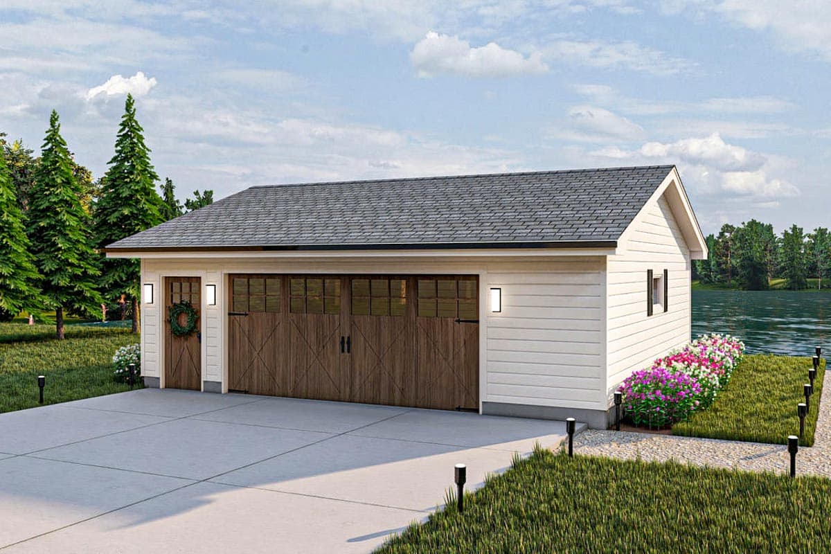 House plan exterior: One-story garage with two wooden garage doors, a side entry door, gable roof, and vinyl siding.