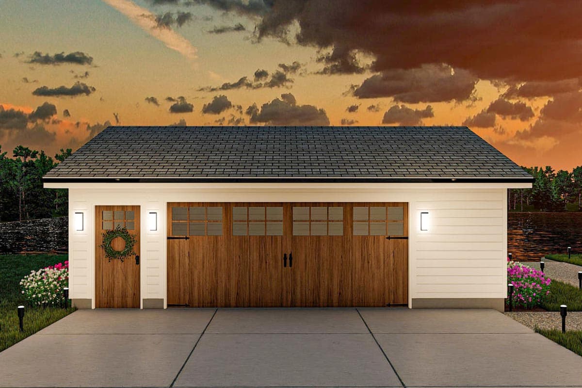 Garage exterior with one single door and two double garage doors, all with wood grain finish and square pane windows.