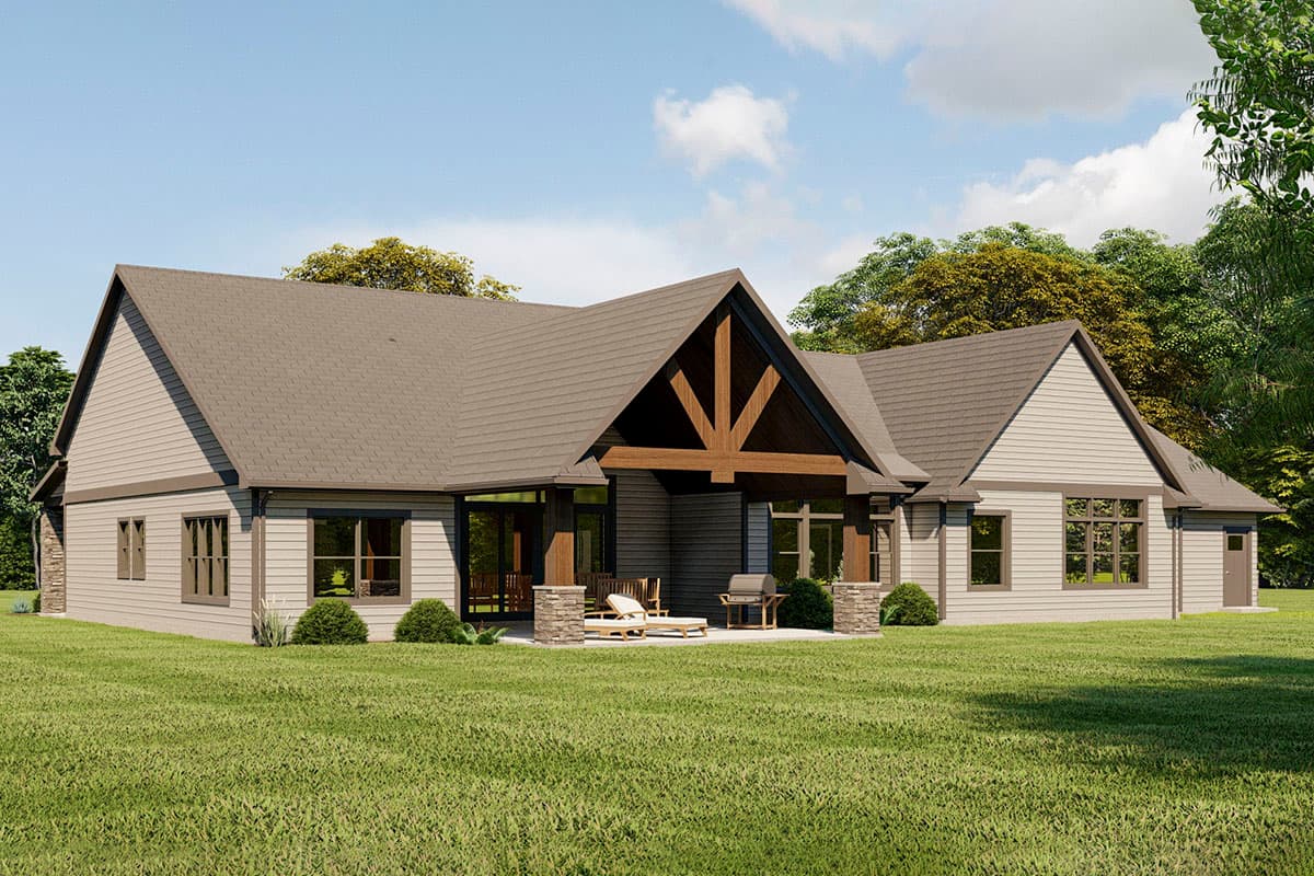 House plan exterior: Ranch style with covered porch, exposed timber beams, and multiple gables.