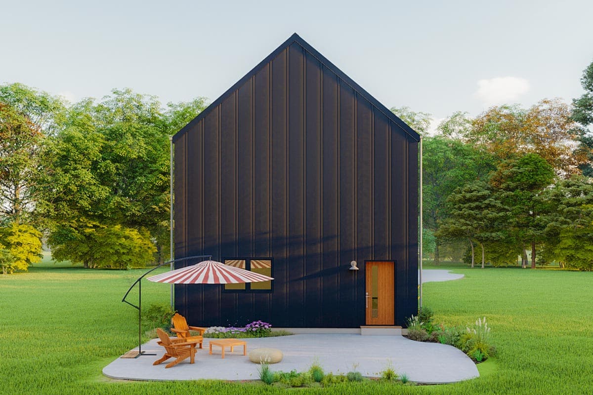 House plan exterior: Tall, modern home with dark vertical siding, a steeply pitched gable roof, and a single wooden door.