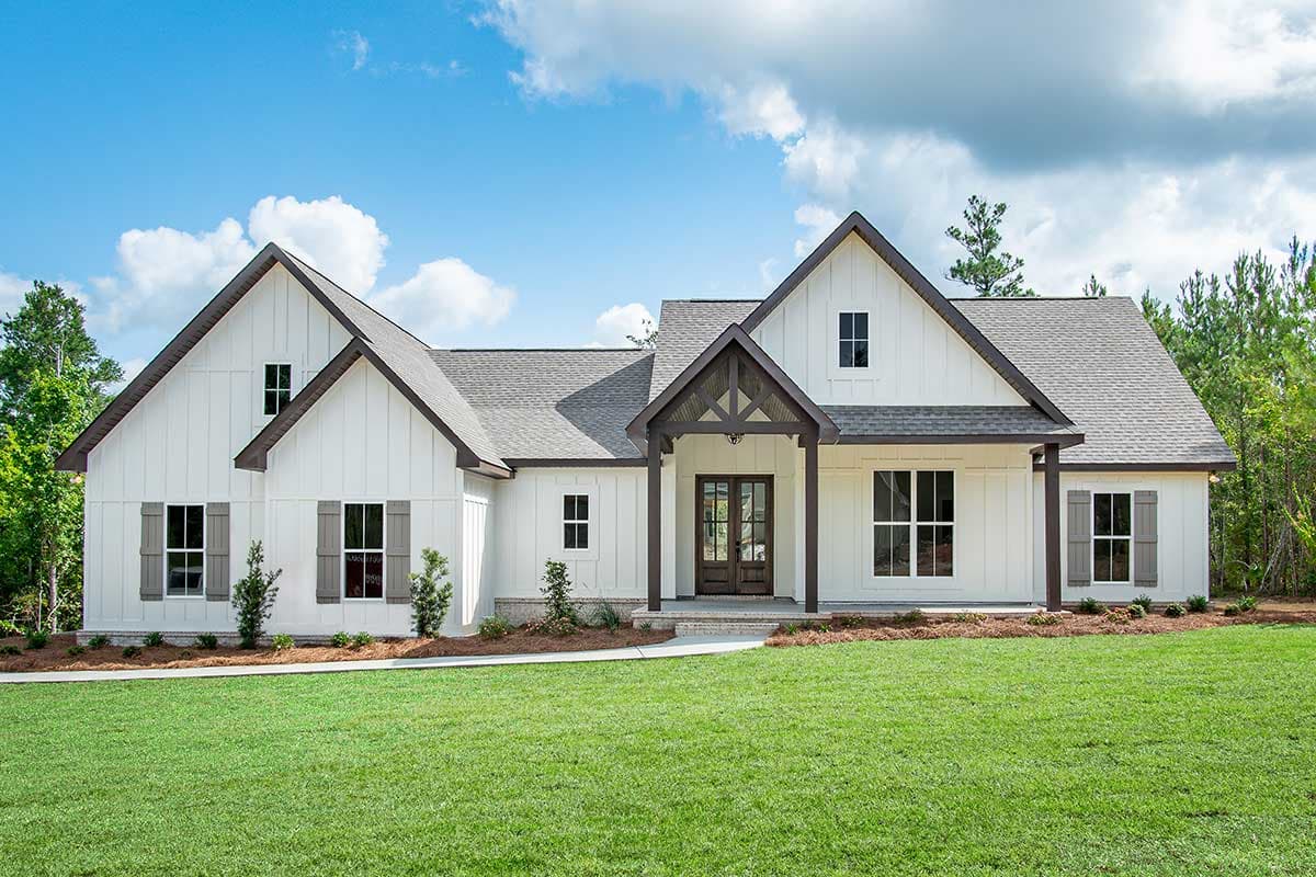 House plan exterior. Modern Farmhouse style, one-story. Features include gabled rooflines, a covered porch, and board-and-batten siding with shutters.
