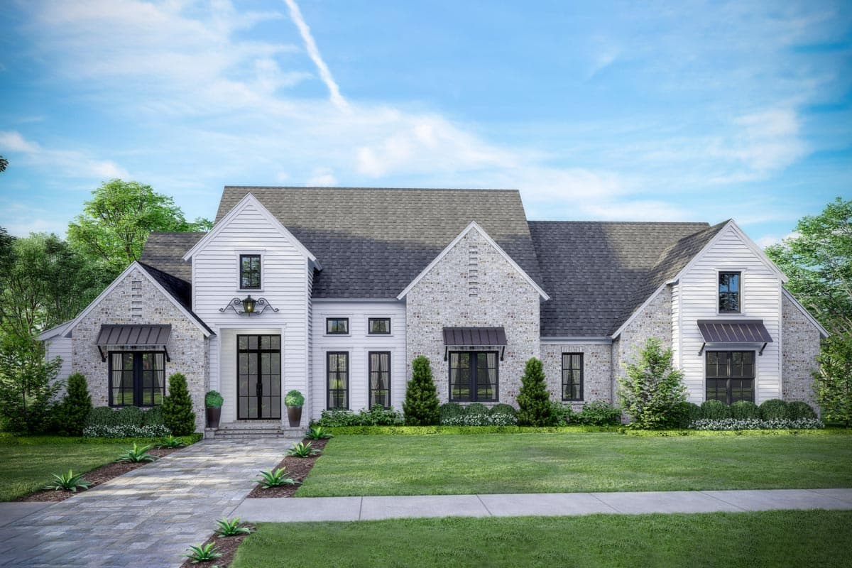 House plan exterior. Two-story Modern Farmhouse with gables, stone accents, and awnings. Features include a walkway and front door with sidelights.