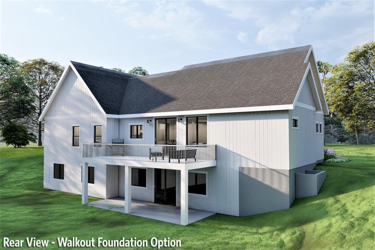Rear view of a two-story house plan with gabled rooflines, a deck, and a walkout foundation.