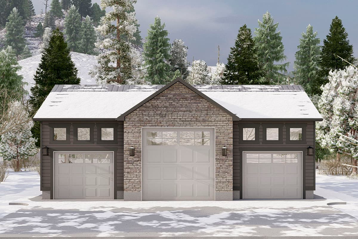 House plan exterior with three-car garage, gable roof, and stone facade. Features include dark siding, small square windows, and a snow-covered roof.