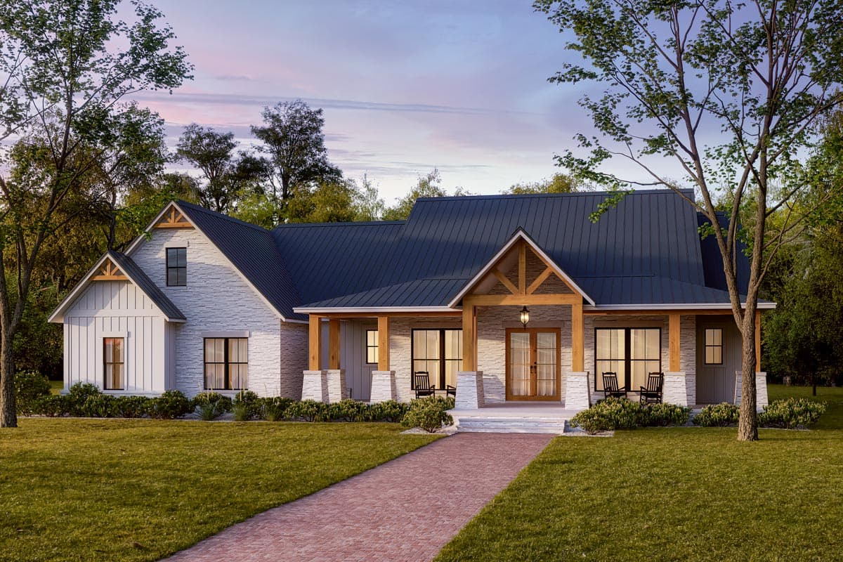 Modern farmhouse exterior with gabled dormers, stone and board and batten siding, and a covered front porch with wooden beams.
