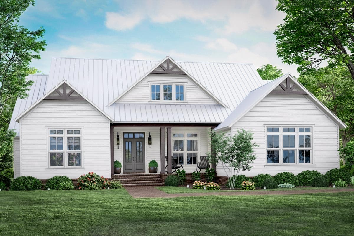 House plan exterior. Modern Farmhouse style with a metal roof, front porch, and gabled dormers above the front entry.