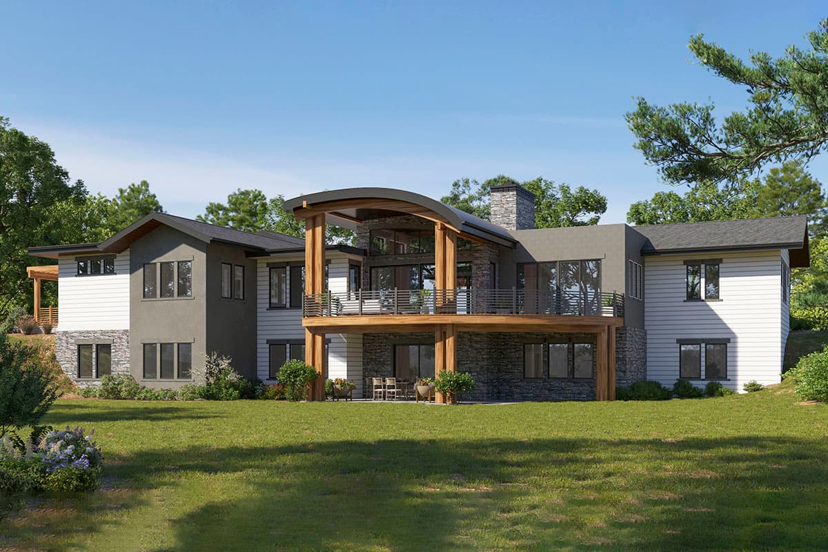 Modern house plan exterior with stone and horizontal siding, multilevel decks, and a curved roofline over the main living area.