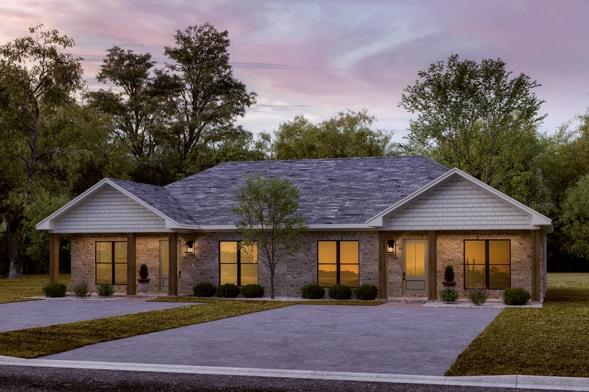 House plan exterior: single-story duplex with brick facade, prominent gables, shake siding, and covered porches.