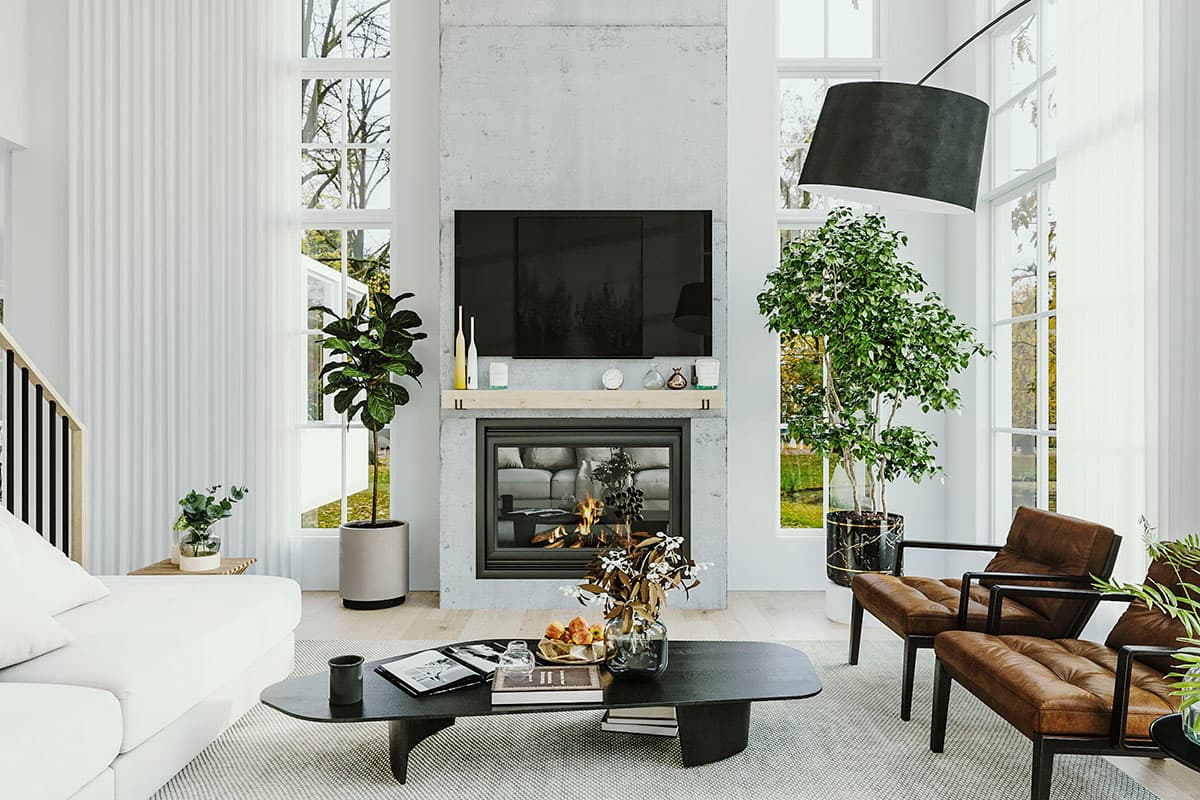 Modern living room with a concrete fireplace, floor-to-ceiling windows, a white sofa, and leather armchairs.