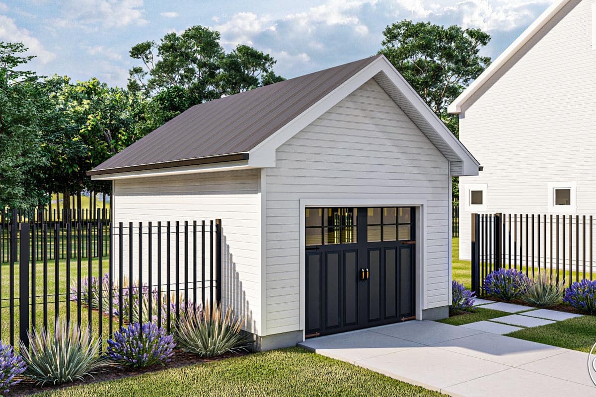 House plan exterior: Gable roof, white horizontal siding, dark garage door with window panes, black metal fence.