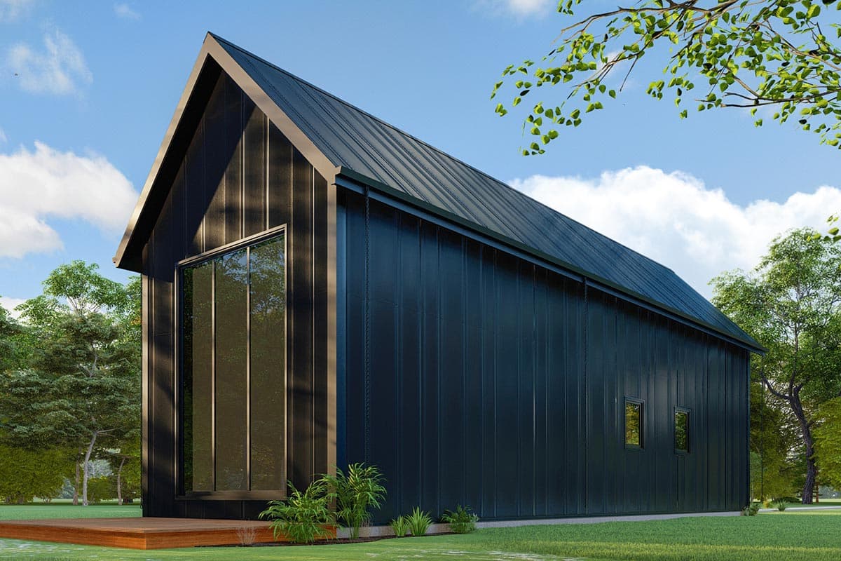 House plan exterior. Modern style with a single gable roof. Features include a large window, board and batten siding, and a small deck.