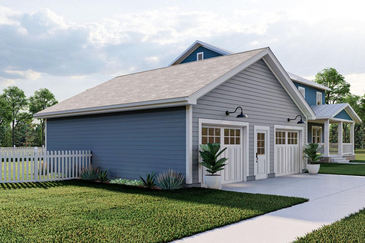 House plan exterior: Two-car garage with white paneled doors, siding, gabled roof, and wall-mounted gooseneck lights.