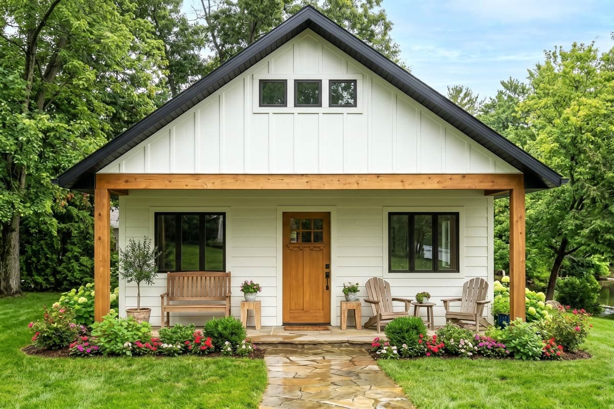 House plan exterior. Modern farmhouse style with a single story, front porch with exposed beams, gabled roof, and vertical siding.