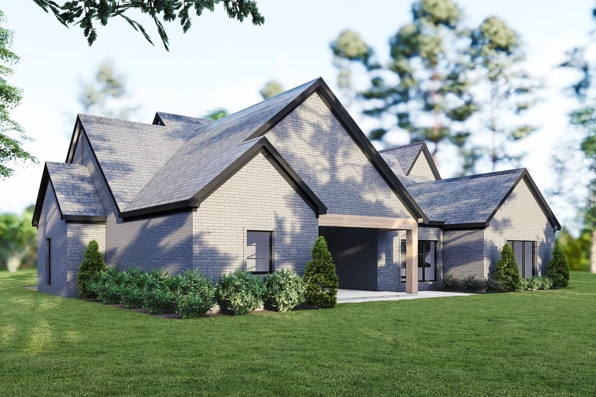 House plan exterior: Modern style, brick facade, gable rooflines, attached garage, and covered entryway.