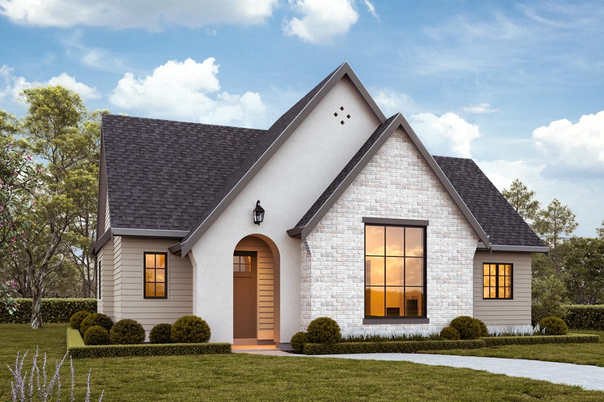 House plan exterior. One-story design with gabled roof, brick and stucco facade, and arched entry. Features a large window and dormer.