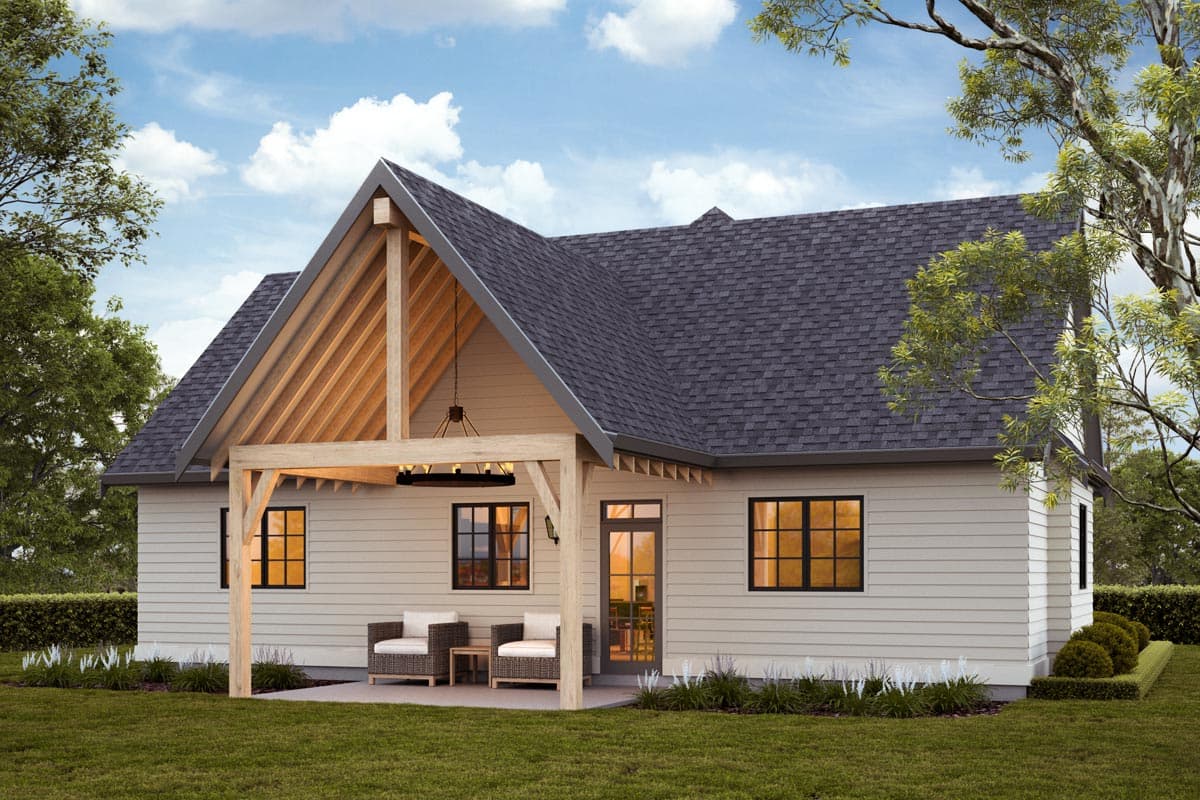 Modern Farmhouse style house plan exterior with exposed rafter gable, covered porch, and horizontal siding.