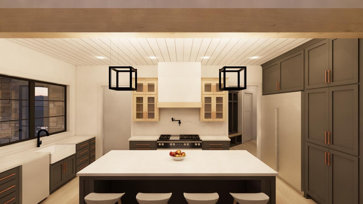 Modern kitchen with large island, dark cabinets, and geometric light fixtures. A fruit bowl sits on the island. The overall design is minimalist.