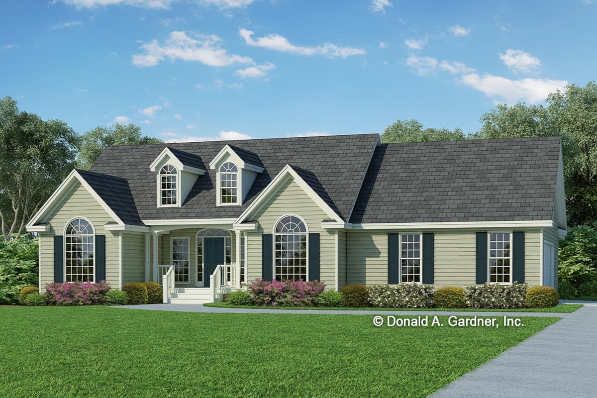 House plan exterior. Ranch-style home with multiple gables, dormers, and arched windows. Features include a front porch and symmetrical design.