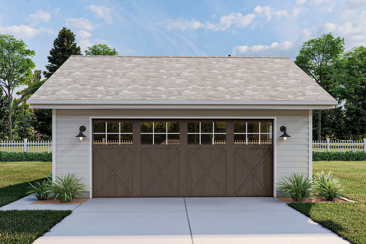 House plan exterior: Two-car garage with X-paneled doors, transom windows, and wall-mounted lanterns.