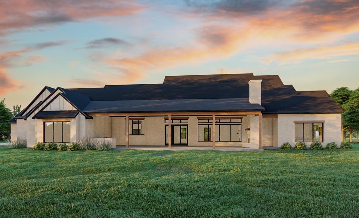 House plan exterior: Modern Farmhouse style, one story, with gabled dormers, covered patio, and brick exterior.