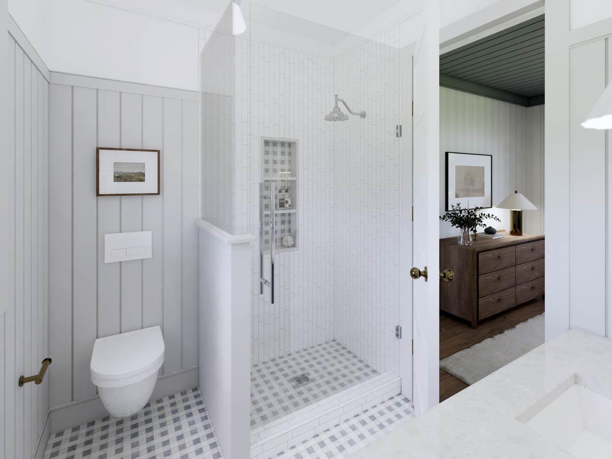 A modern bathroom interior featuring a walk-in shower with white subway tile, a toilet, and an adjacent bedroom space with wooden furniture.