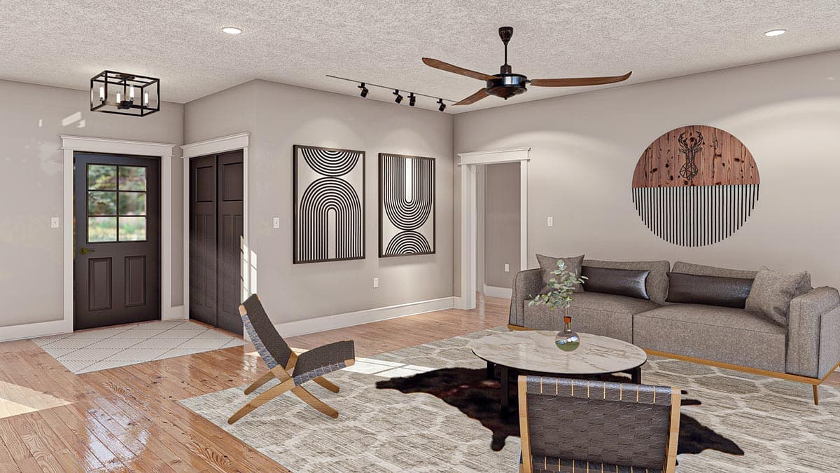 Living room with neutral walls, wood floors, dark door, abstract art, sofa, chairs, coffee table, and ceiling fan.