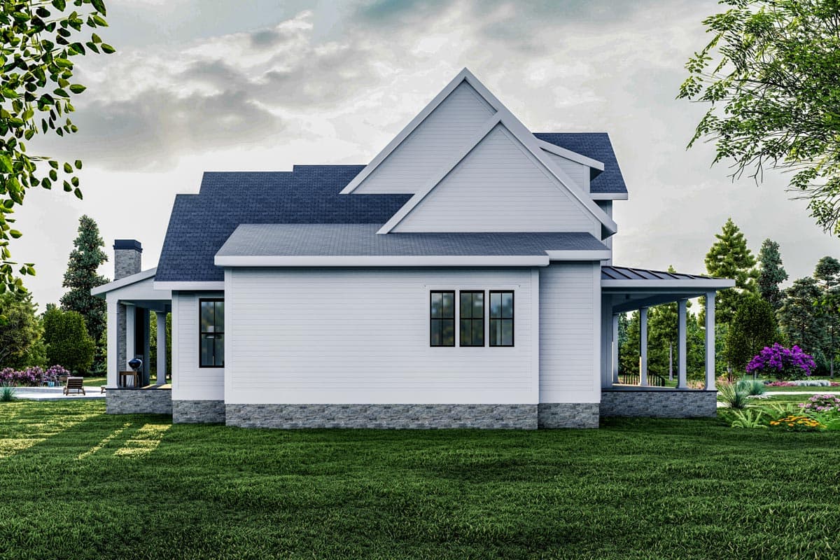 House plan exterior: Modern Farmhouse style, two stories, gabled rooflines, stone foundation, and covered porch.