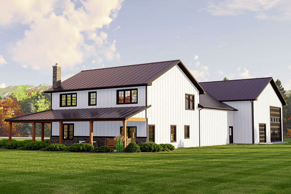 Modern Farmhouse house plan exterior with a wraparound porch, metal roof, stone accents, and an attached garage.