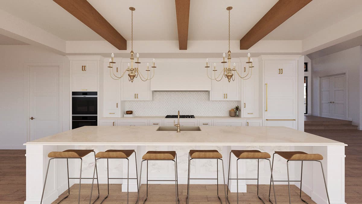 Kitchen with island seating, white cabinetry, double ovens, gas range, twin chandeliers, and wood ceiling beams.