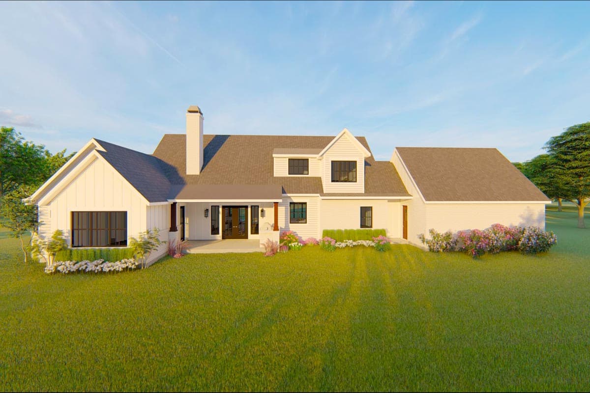 Modern Farmhouse style house plan exterior with gables, prominent chimney, and attached garage.