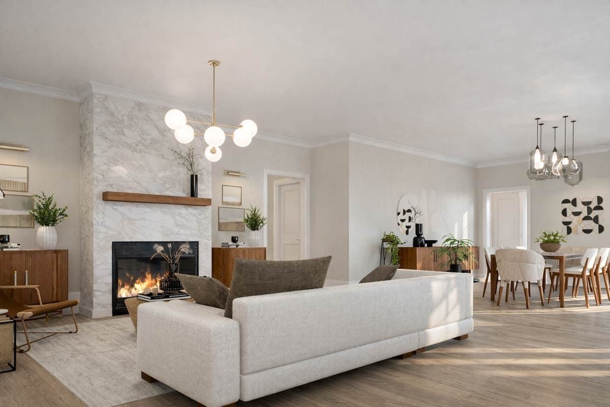 Open concept living and dining area with a marble fireplace, modern chandelier, and dining set.