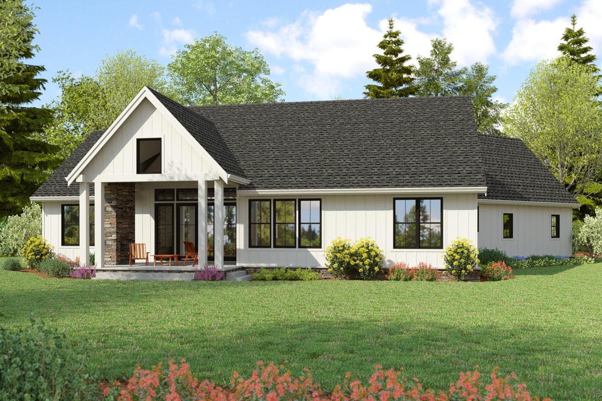 Modern Farmhouse style house plan exterior, one story, featuring a covered porch with stone accents, gabled roof, and large windows.