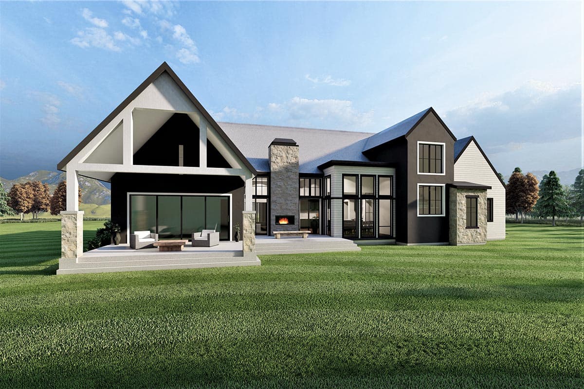 House plan exterior rendering featuring a modern style with large gables, stone accents, an outdoor fireplace, and extensive glazing.