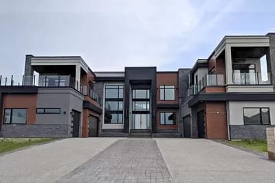 Spacious Modern Home Plan with Courtyard Entry and Finished Basement - 7654 Sq Ft