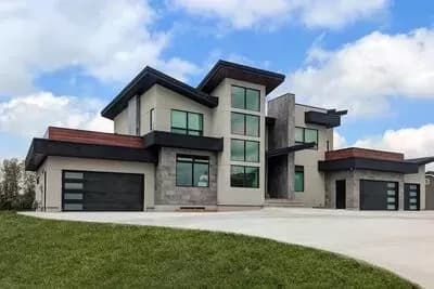 Modern Home Plan Under 4200 Square Feet with Over 2000 Square Feet of Garage Space