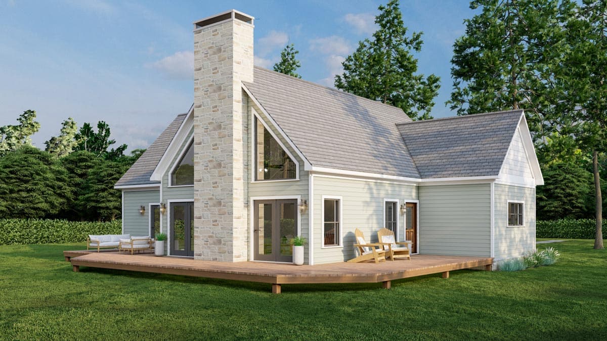 House plan exterior: Two-story home with stone chimney, large gabled windows, wrap-around deck, and light green siding.