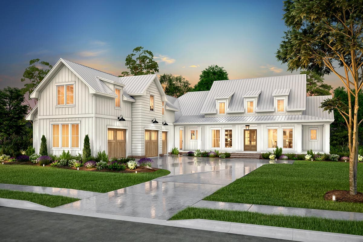 Modern farmhouse house plan exterior with a metal roof, gables, dormers, a covered porch, and a three-car garage.