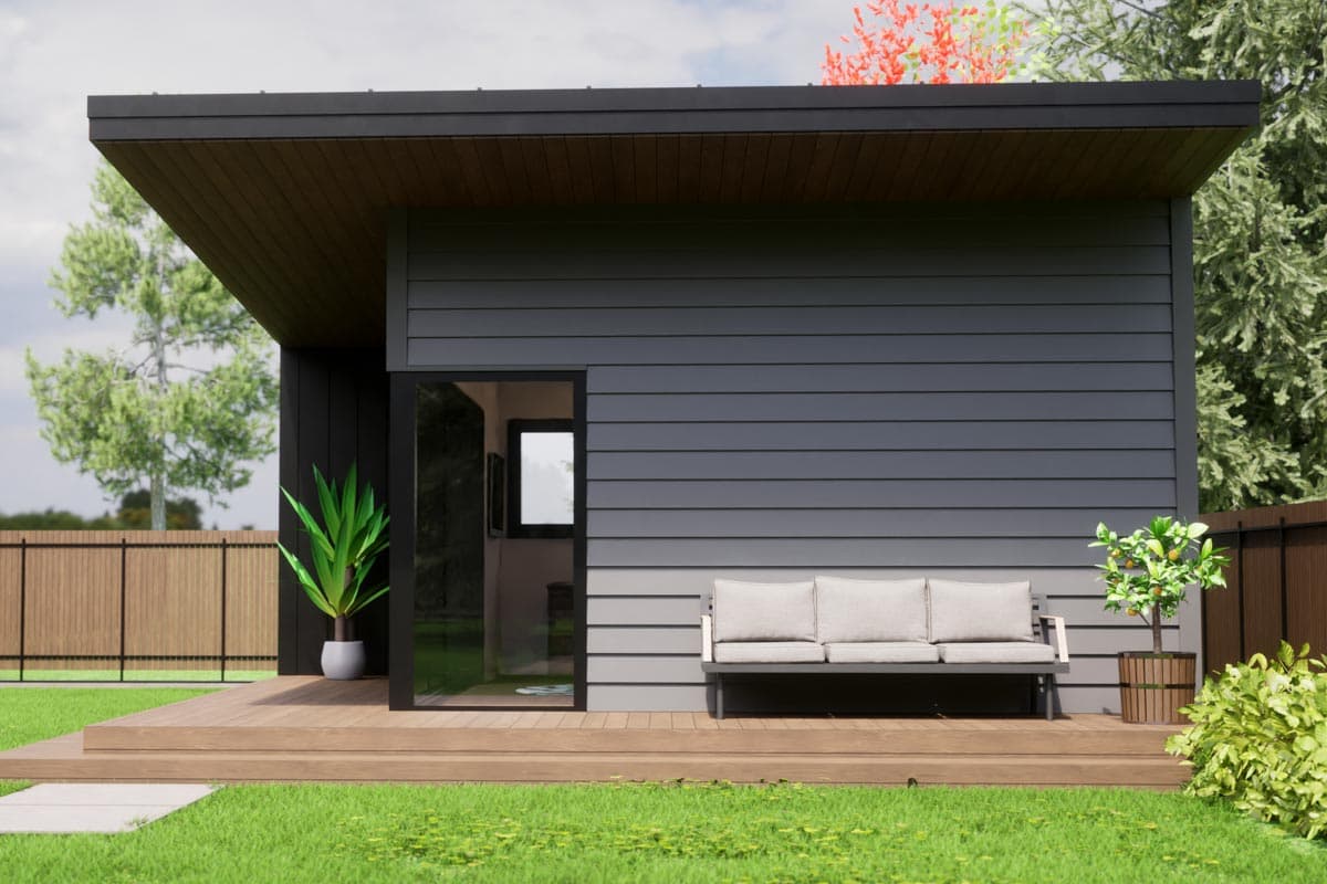 Modern house plan exterior with a single story, horizontal siding, cantilevered roof, and glass door.
