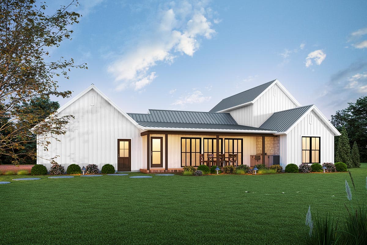 Modern Farmhouse house plan exterior with metal roof, gable, covered porch with outdoor kitchen, and large windows.