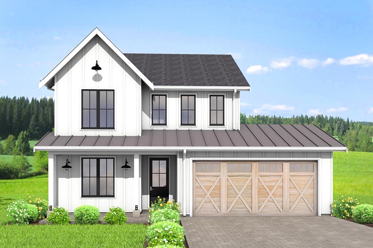 A two-story farmhouse-style house with white siding, black-framed windows, a gray metal roof, and a wooden garage door set in a green landscape.