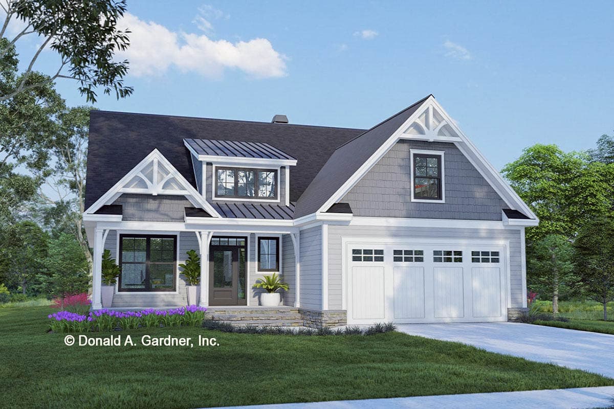House plan exterior in a two-story Craftsman style. Features include a front porch, gables with decorative trim, and a three-car garage.
