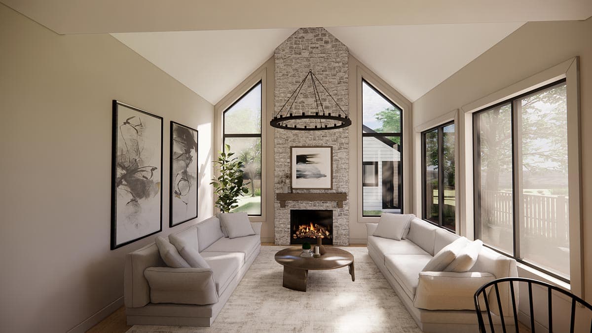 Interior rendering of a great room with vaulted ceiling, stone fireplace, two sofas, and large picture windows.
