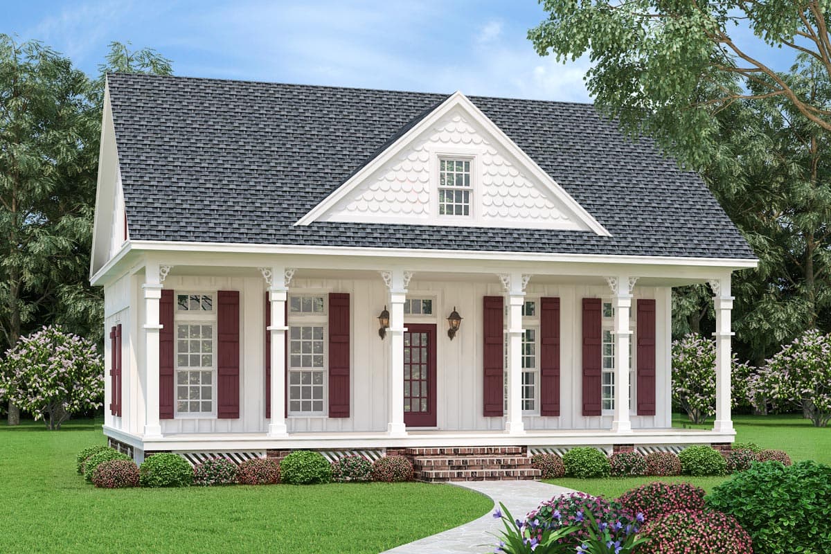 House plan exterior. One-story Cottage style home with front porch, gabled roof, decorative brackets, and red shutters on windows.