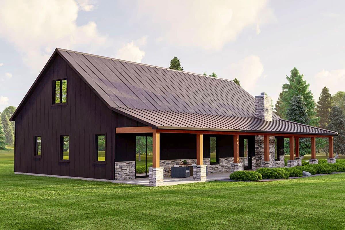 Modern farmhouse house plan exterior with metal roof, stone accents, and a wrap-around porch supported by timber posts.