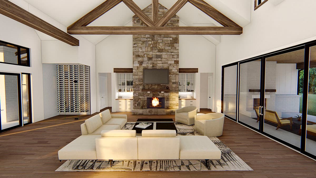 Great room with vaulted ceiling, exposed beams, stone fireplace, and floor-to-ceiling windows. Features built-in cabinetry and a wine display.