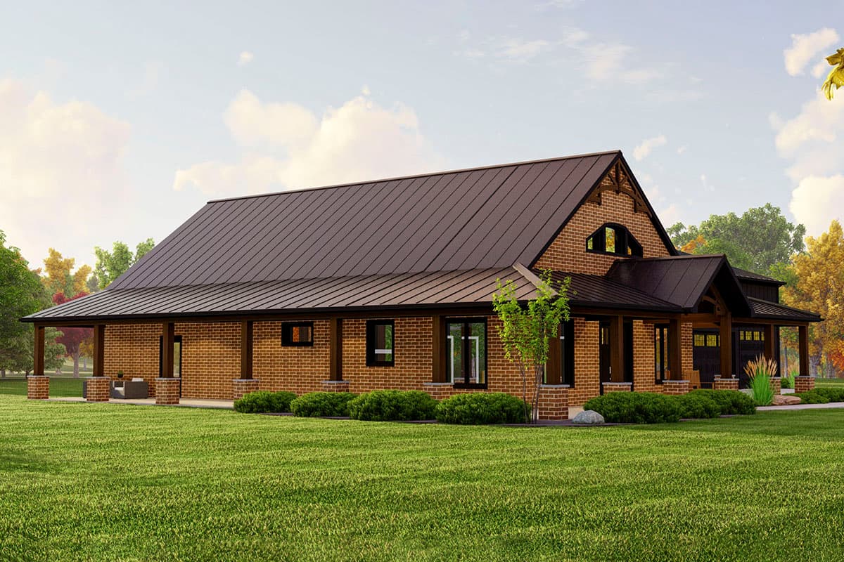 House plan exterior: One-story brick home with a wraparound porch, metal roof, gabled dormer, and attached garage.